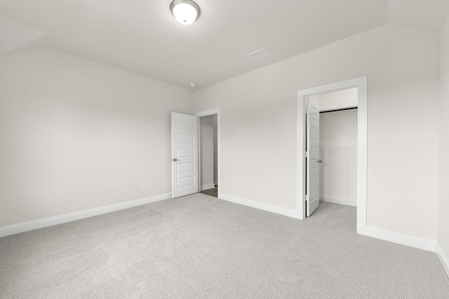 4707 Arbor Park Dr, Manvel, TX 77583 - unfurnished bedroom with vaulted ceiling, carpet, a spacious closet, baseboards, and a closet
