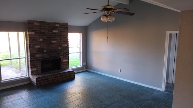 unfurnished living room featuring lofted ceiling with beams, a brick fireplace, and ceiling fan