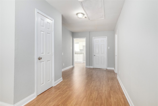 hallway featuring light wood-type flooring