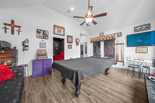 playroom with vaulted ceiling, pool table, hardwood / wood-style flooring, and ceiling fan