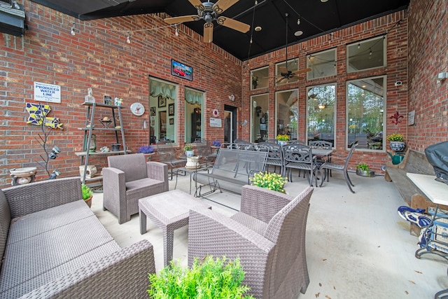 view of patio featuring ceiling fan and an outdoor living space