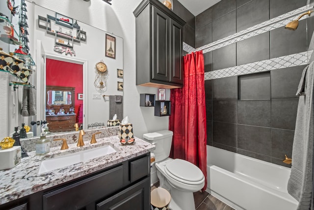 full bathroom featuring toilet, shower / bath combo, vanity, and wood-type flooring