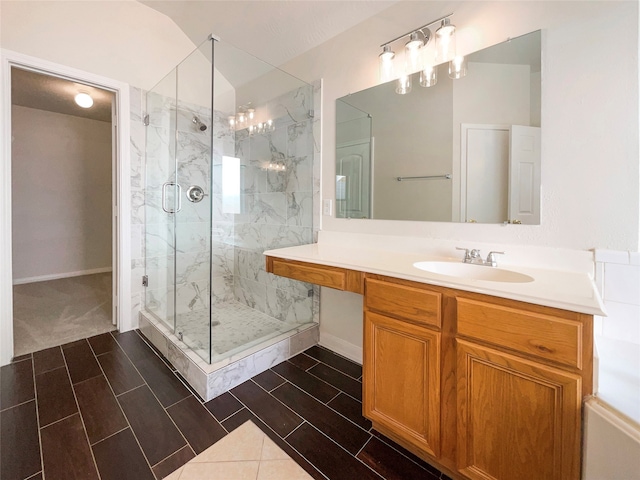 bathroom with vanity and walk in shower