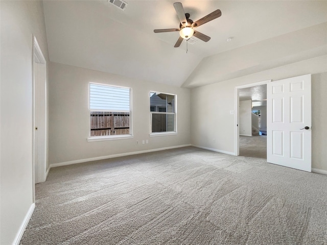 interior space with lofted ceiling and ceiling fan