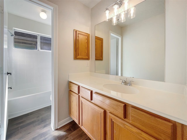 full bathroom featuring vanity, shower / tub combination, toilet, and wood-type flooring