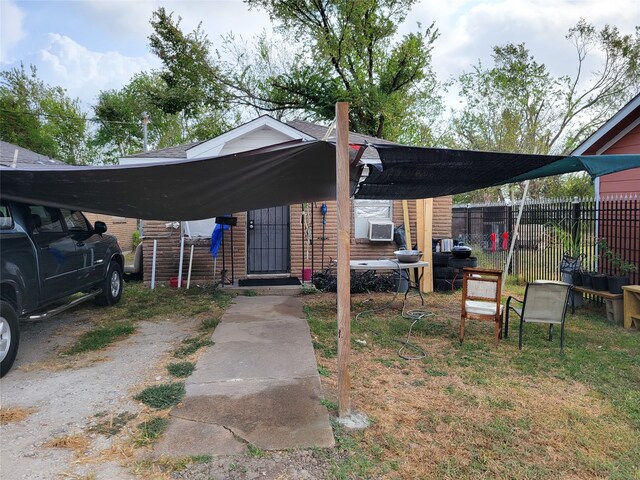 exterior space featuring a carport