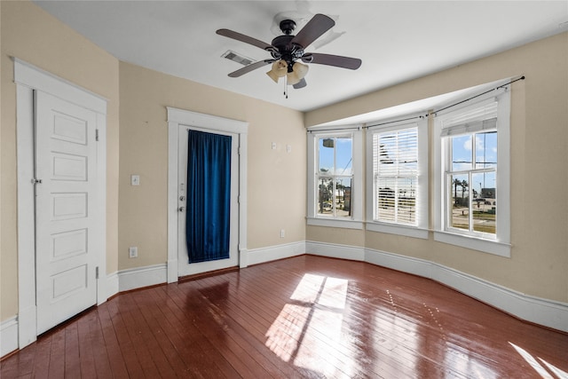 unfurnished room featuring wood-type flooring and ceiling fan