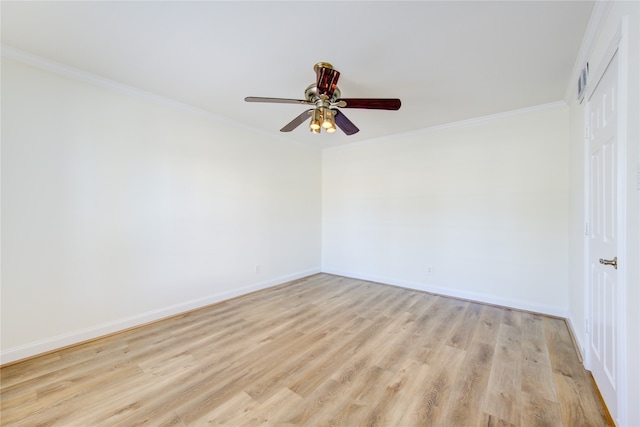 spare room with ornamental molding, light wood-type flooring, and ceiling fan