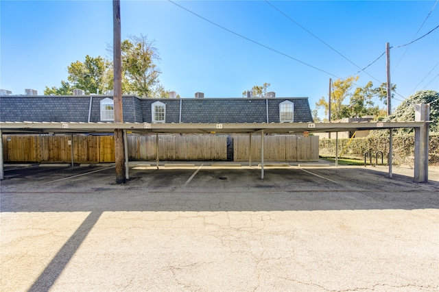 view of parking with a carport