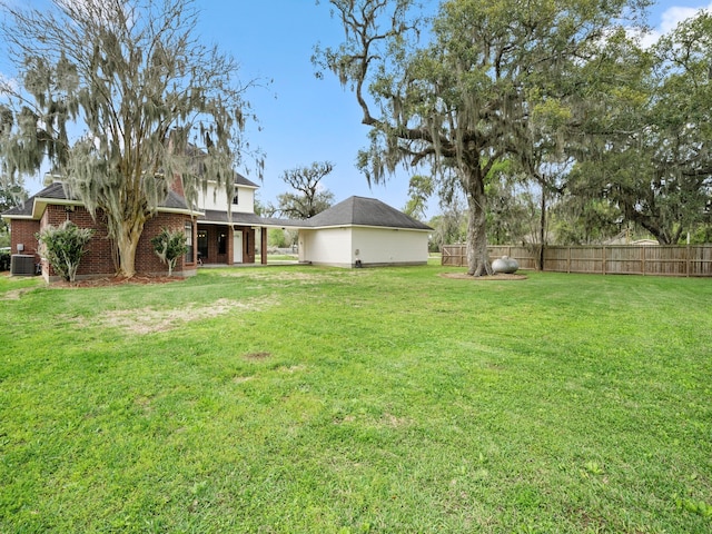 view of yard featuring central AC