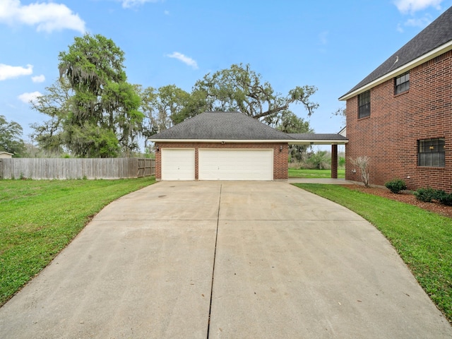 exterior space with a lawn and a garage