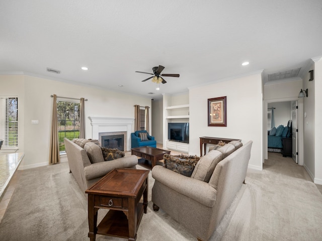 living room with crown molding, light colored carpet, and ceiling fan