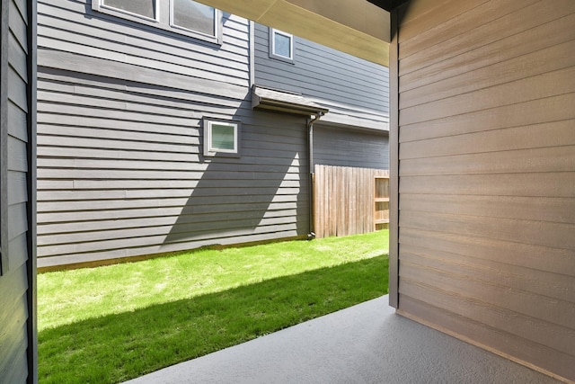 view of patio featuring fence