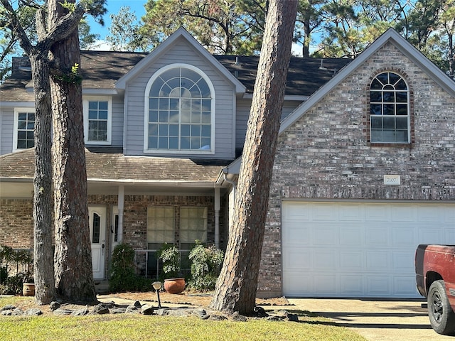 view of front of property with a garage