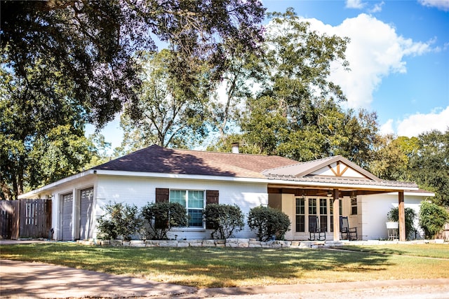 ranch-style home with a front lawn