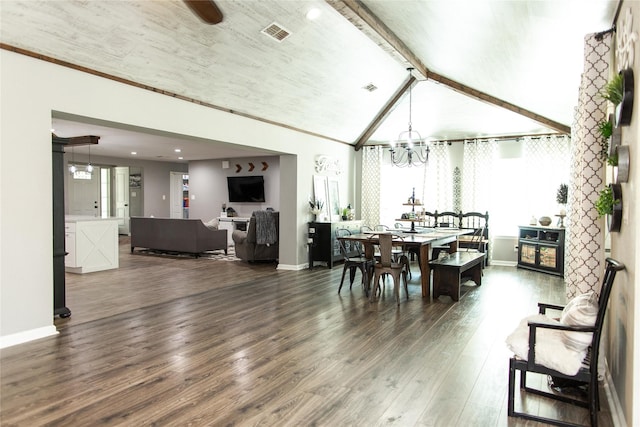 dining area with vaulted ceiling with beams, dark wood-type flooring, and a notable chandelier