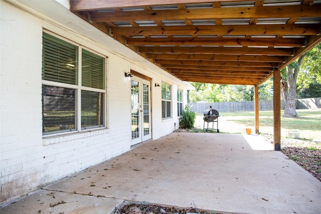 view of patio / terrace featuring grilling area and french doors