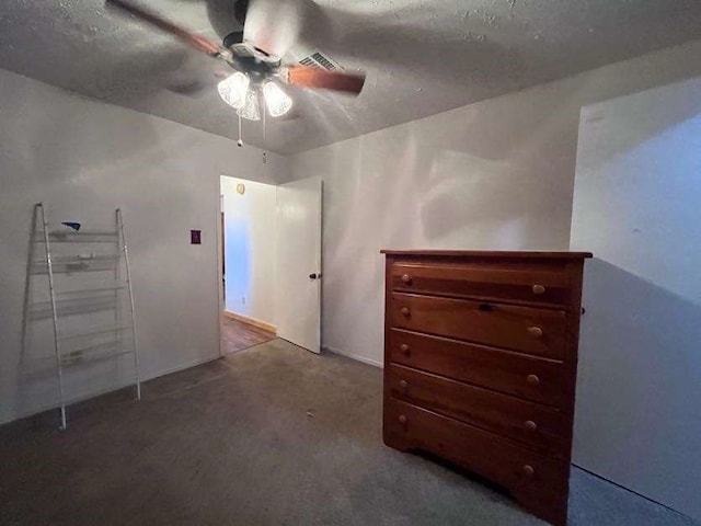 unfurnished bedroom with carpet and ceiling fan