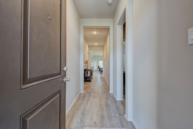 hall featuring light wood-type flooring