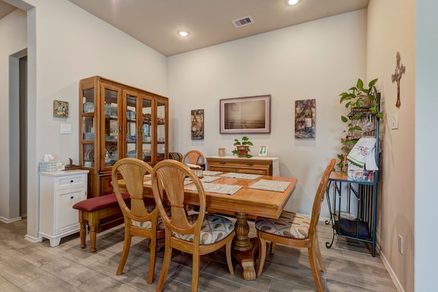 dining room featuring light hardwood / wood-style flooring