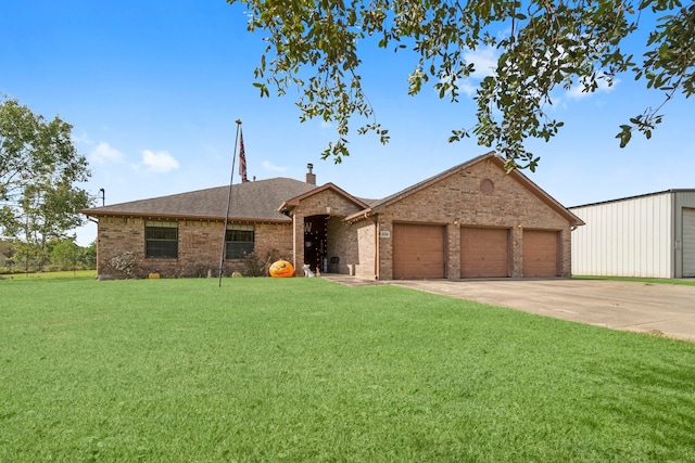 ranch-style home with a front yard and a garage