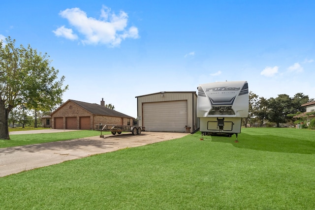 view of front of house with a front yard and a garage