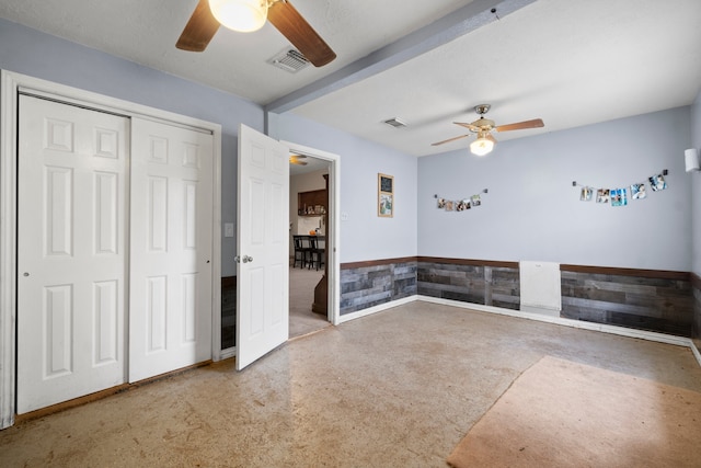 spare room with ceiling fan