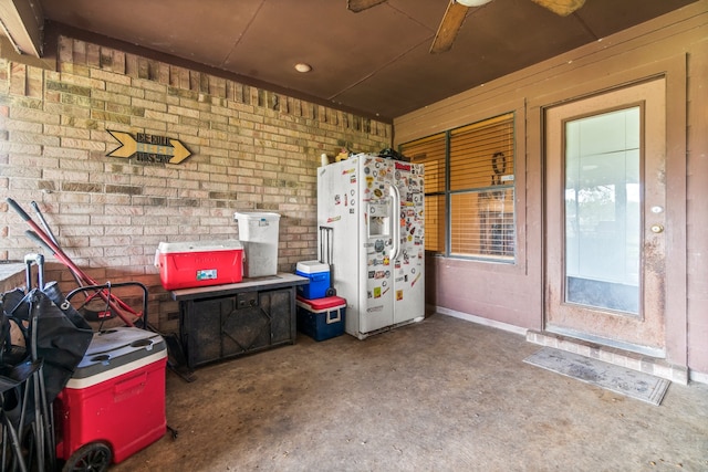 view of patio featuring ceiling fan