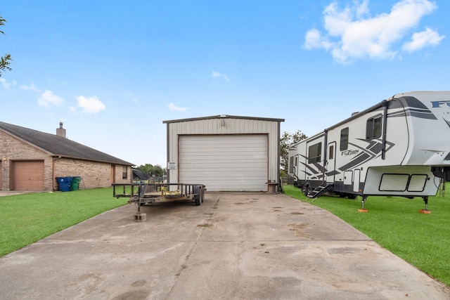 garage featuring a yard