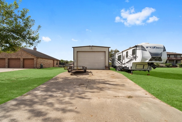 exterior space featuring a garage and a lawn