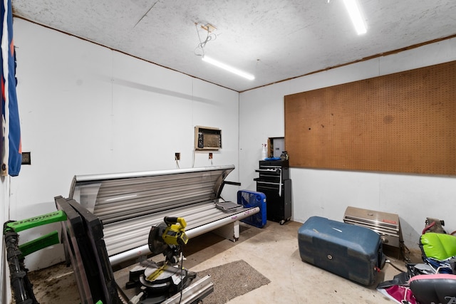 miscellaneous room featuring a textured ceiling