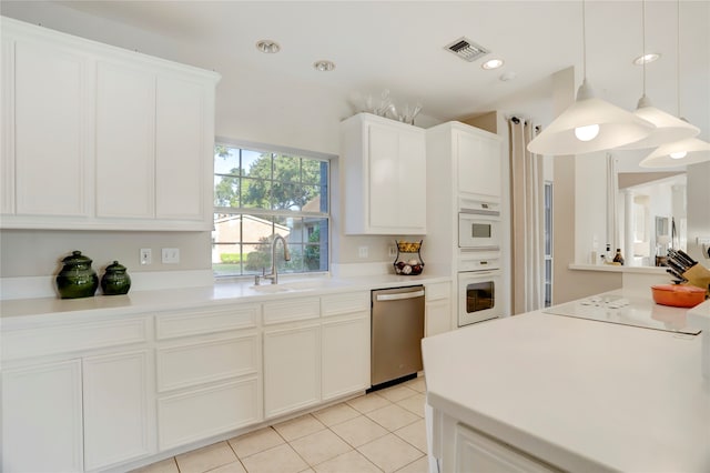 kitchen featuring light tile patterned floors, white cabinetry, dishwasher, black electric stovetop, and sink