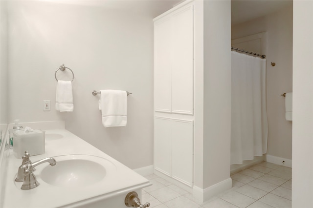 bathroom featuring vanity, shower / bath combination with curtain, and tile patterned flooring