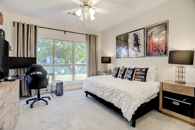 carpeted bedroom with ceiling fan