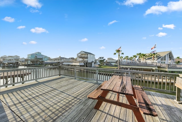 wooden deck with a water view