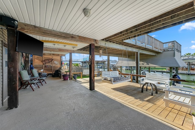 view of patio featuring a water view