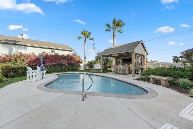 view of swimming pool with a gazebo and a patio area