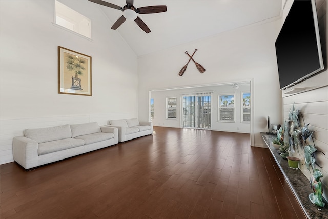 living room with high vaulted ceiling, dark wood-type flooring, and ceiling fan