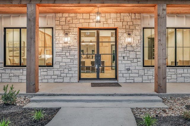 entrance to property featuring french doors