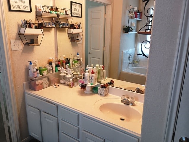 bathroom featuring vanity and a bathtub