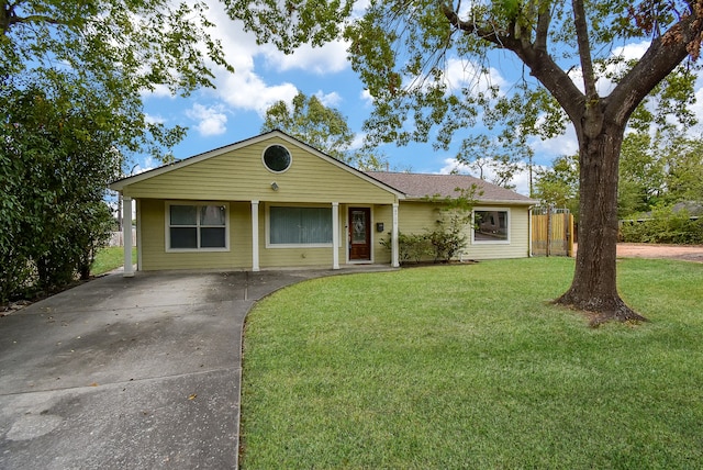 ranch-style house with a front yard