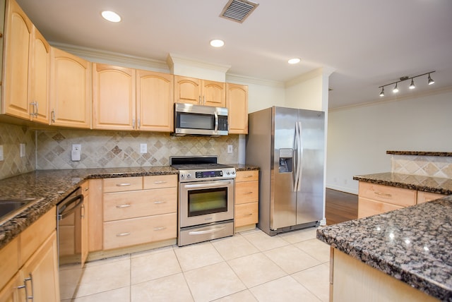 kitchen with backsplash, appliances with stainless steel finishes, ornamental molding, and light brown cabinets