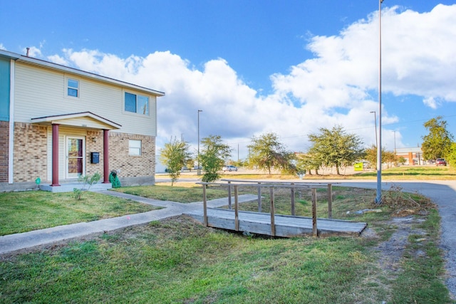 exterior space with a lawn