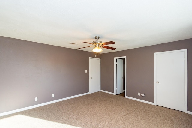 unfurnished bedroom featuring carpet flooring and ceiling fan