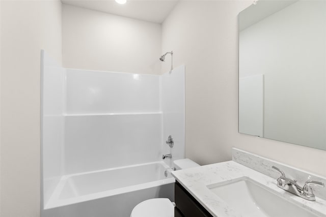 full bathroom with vanity,  shower combination, and toilet