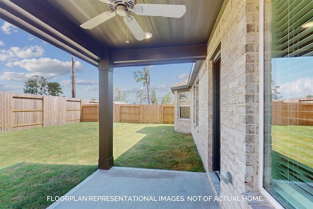 view of yard with ceiling fan