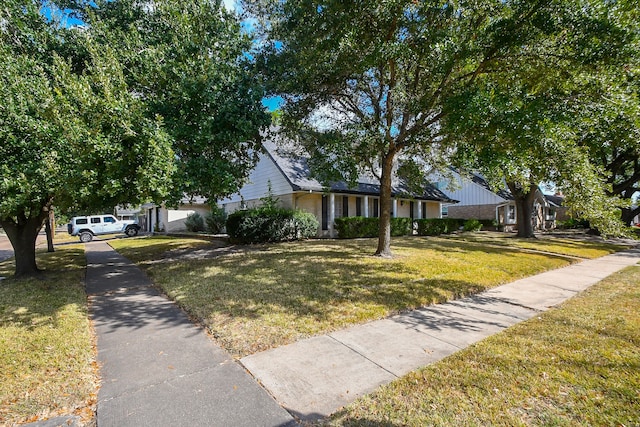 view of front of property with a front lawn