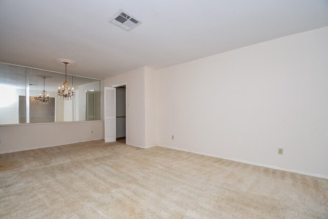 8218 Hazen St, Houston, TX 77036 - carpeted spare room with a chandelier