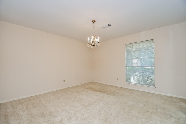 8218 Hazen St, Houston, TX 77036 - empty room with a chandelier, carpet flooring, and baseboards