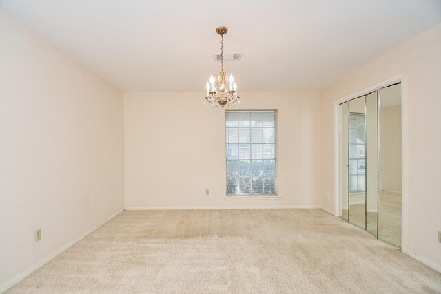 8218 Hazen St, Houston, TX 77036 - carpeted spare room featuring a chandelier and baseboards